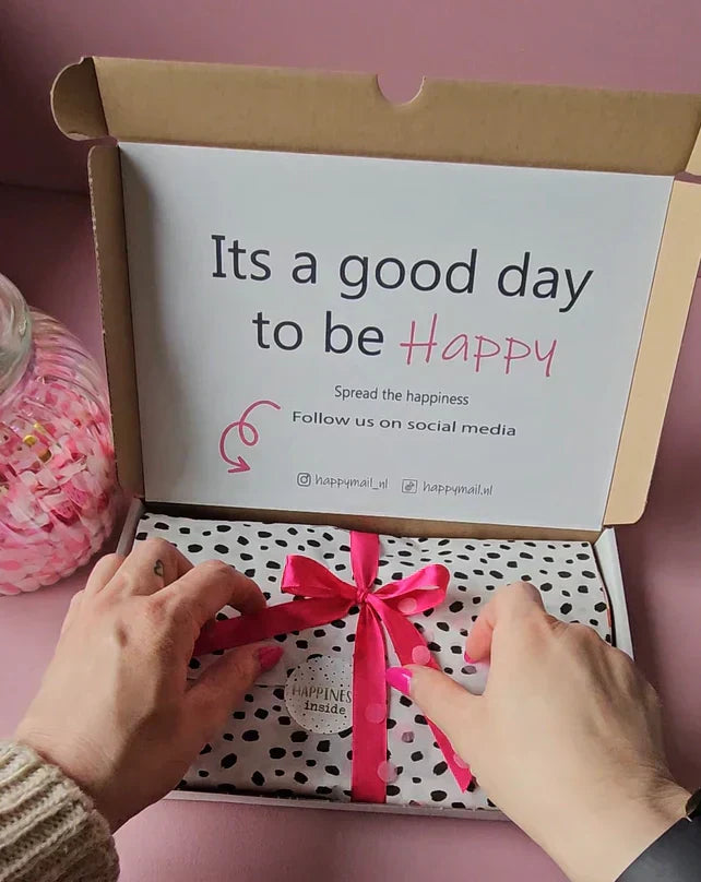 "Surprisebox met vrolijke inhoud – brievenbuscadeau met maandthema"