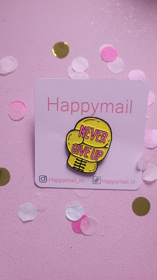 "Never give up" pin