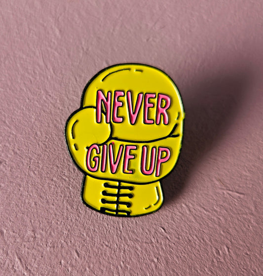 "Never give up" pin