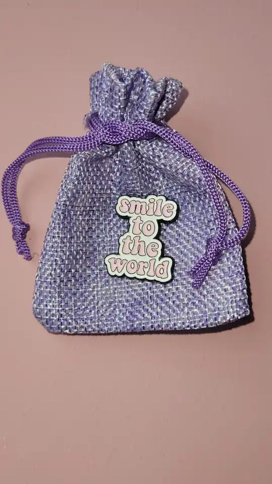 Pin 'smile to the world'